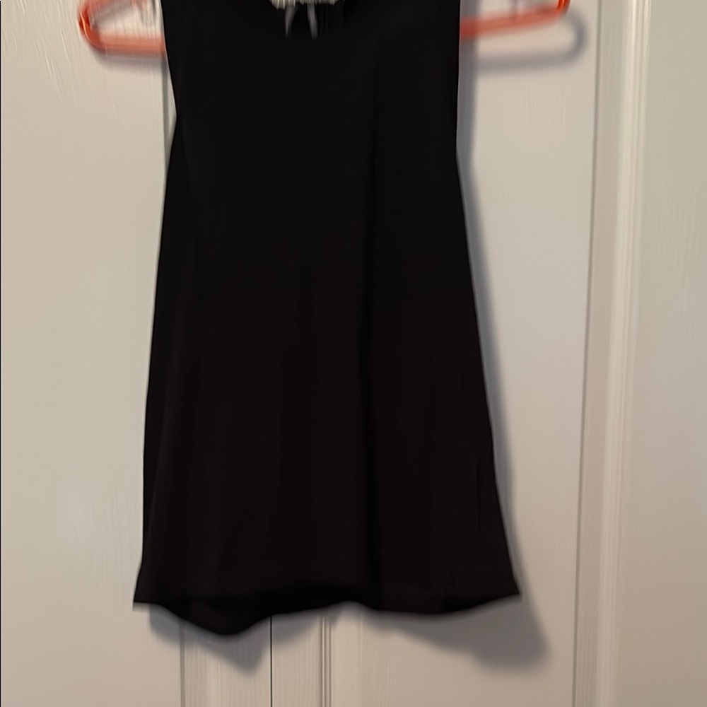 Black Sleeveless Top by Anthropologie